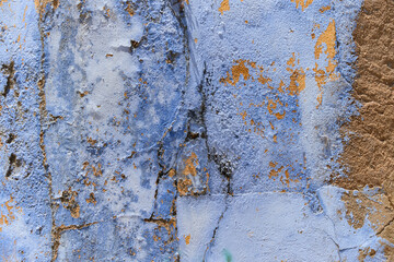 faded and decrepit wall in Olhao, algarve, portugal