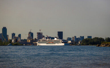 Fototapeta premium A luxury cruise ship docks in port at sunset. Passenger vessel Travels