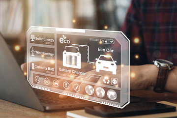 Fototapeta premium Businessman using a computer to ECO Energy sources for renewable, sustainable development. Ecology concept. Elements