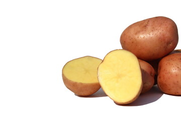  A pile of pink potatoes lies on a white isolated background.