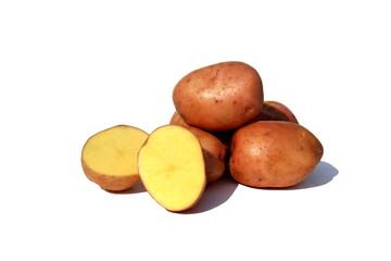  A pile of pink potatoes lies on a white isolated background.