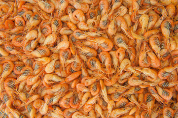 Cooked shrimps food background, top view