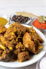 Closeup of Indian Domestic Chicken Curry or Gravy in a Plate, Authentic Homemade Spicy Chicken Dish Cuisine