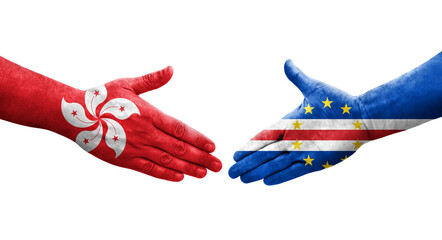 Handshake between Cape Verde and Hong Kong flags painted on hands, isolated transparent image.