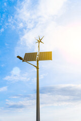 Solar energy panels power. Renewable photovoltaic technology with solar energy power panel and wind turbine. Alternative energy sources concept.