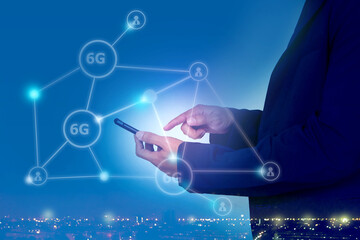 Business hand using smart phone; 6G network technology; Business investment for wireless technology