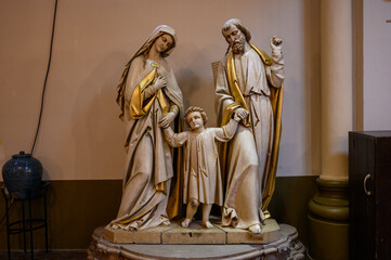 Sculpture of the Holy Family – Jesus, Mary and Joseph in the St Alphonse church in Luxembourg City, Luxembourg. 2021/07/04. - obrazy, fototapety, plakaty