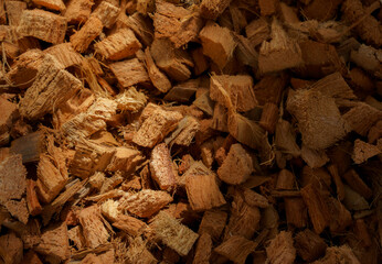 Coconut husks cut into small pieces for ornamental planting.