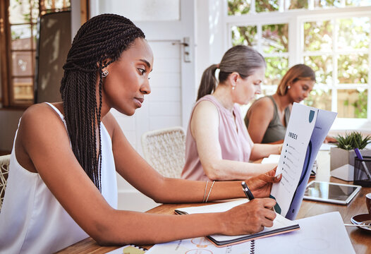 Black Woman With Business Documents, Writing At Desk And Women Working Together On Audit Report At Startup. Diversity, Teamwork And Success, Reading Small Business Project Proposal And Taking Notes.