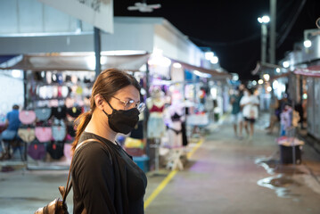 Woman (LGBTQ) posing with food at thai street food
