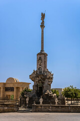 Fototapeta na wymiar The Triumph of San Rafael de la Puerta del Puente, Cordoba, Spain