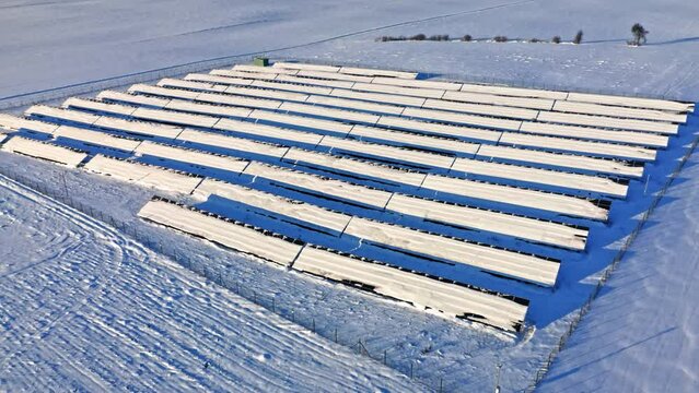 Alternative Energy In Poland. Snowy Photovoltaic Farm In Winter