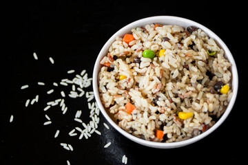 Rice mixed grains on black background