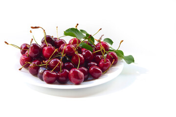 Ripe cherries on pure white background