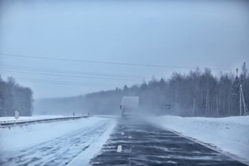winter highway snowfall background fog poor visibility