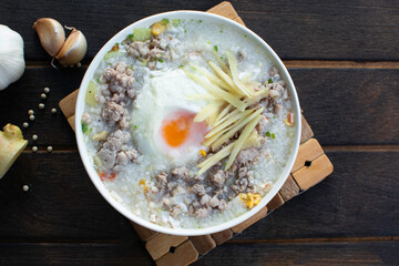 Porridge in a cup on the wooden floor