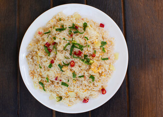 fried rice in a plate isolated on white background