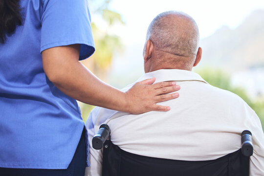 Homecare, nurse and wheelchair for disabled elderly man, with injury in spine or legs. Healthcare, disability and senior in nursing home for wellness, recovery and health in Cape Town after stroke