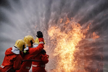 silhouette of Firefighters wear firefighting clothing with equipment. Learn skills and simulate firefighting events.