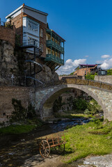 Fototapeta na wymiar A bridge over Tsavkisis-Tscali river in Leghvtakhevi gorge in Tbilisi, Georgia