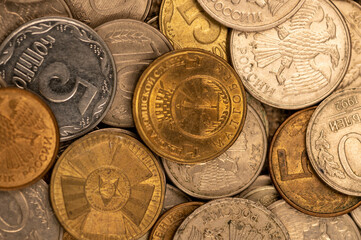 Old coins of the USSR in bulk on a flat surface, background image.