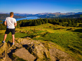 Aerial view of a man on the hike in Windermere in Lake District, a region and national park in Cumbria in northwest England