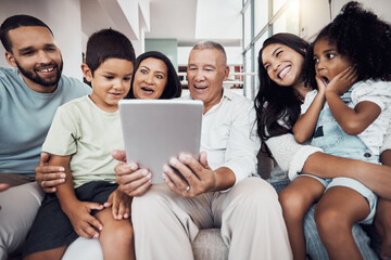 Family, home and fun people with tablet streaming a movie, subscription video or show online. Love,...