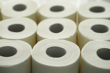 Toilet paper in a roll. Snow-white soft three-layer toilet paper. Lack of hygiene products. Primary protection and disinfection.