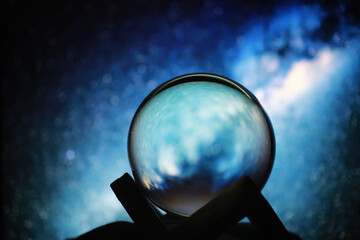 Astrological background. Crystal ball with predictions. Horoscope of the stars. Fortune telling and...