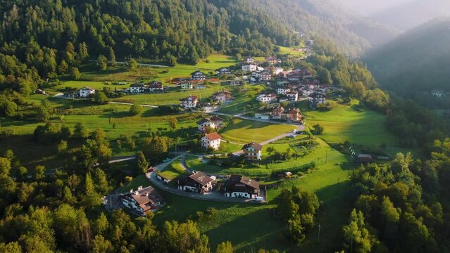 City of Agordo in Italy, surrounded by mountain peaks, beautifull green valeys.