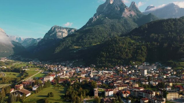 City of Agordo in Italy, surrounded by mountain peaks, beautifull green valeys.