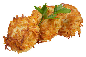 Golden potato pancakes, fried in a pan, decorated with parsley leaf, on a white background