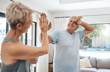 High five, fitness success and senior couple after home workout, exercise and training in house...