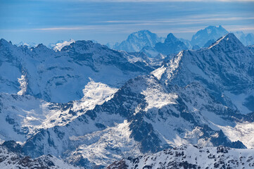 Winter mountain landscape with rocks and snow. Caucasus
