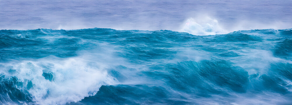 Ocean waves surface texture. Abstract blue water background with splashes of sea foam. 3d