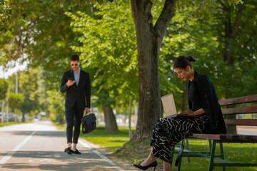 Fototapeta premium A businesswoman is working outside