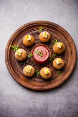 Corn Cheese balls with dip - popular party snack from India