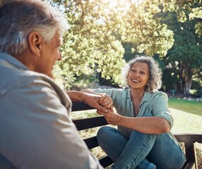 Retirement, relax and love with couple in park together for peace, happy and nature in spring. Wellness, smile and marriage with old man and woman on bench in countryside for nature, summer and date