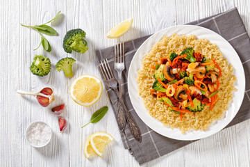 quinoa with fried veggies, mushrooms on plate