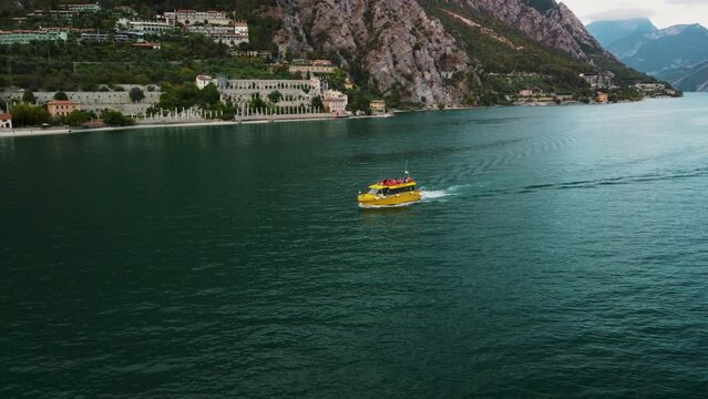 Limone Town in Italy on the Lake Garda, beautiful mountain views, old town red roofs, green lake.