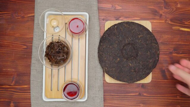 Chinese Tea Ceremony. Pu erh on wooden background. Flat lay