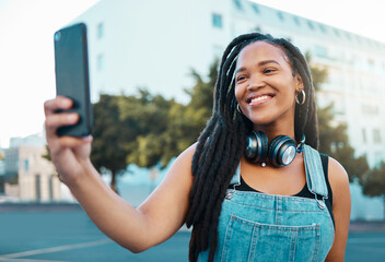 Happy young black woman in city, selfie video call on smartphone and New York wifi 5g connection....