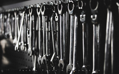 sorted wrenchs on the wall