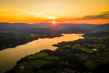 Aerial view of sunset over Windermere in Lake District, a region and national park in Cumbria in northwest England
