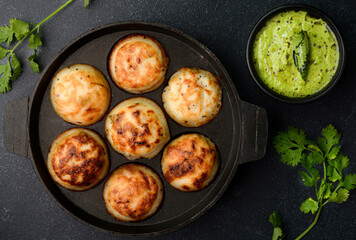 Kuzhi Paniyaram is a traditional south indian breakfast dish made out of rice batter.