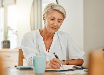 Writing, thinking and senior woman at a house making notes on notebook paper. Retirement of a serious person from Sweden think about schedule, day agenda idea or document and write ideas at home