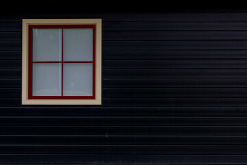 Black wooden wall with white and red frame window, Abstract geometric pattern, Classic horizontal line wall, Can be used as background for display.