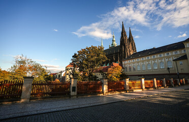 Fototapeta na wymiar Amazing wide angle view with Prague Castle and Saint Vitus Cathedral during a beautiful autumn sunset. Travel to Czech Republic.