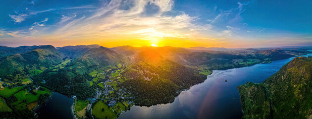 Aerial view of sunset over Ullswater lake in Lake District, a region and national park in Cumbria...