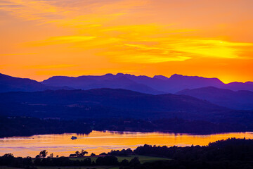 Fototapeta premium View of sunset over Windermere in Lake District, a region and national park in Cumbria in northwest England
